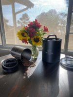 Unleashed Coffee Whole Bean Coffee Spilled Onto Table From Airscape Original Container